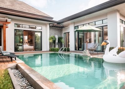 Custom concrete pool on small block by Cove Pools